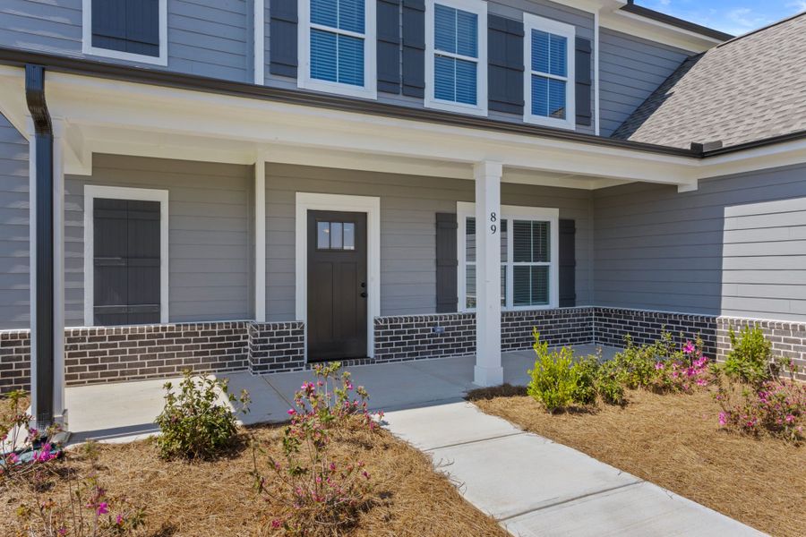 Exterior details and patio area of a home in Cherokee Knoll, Williamston (Image 3).