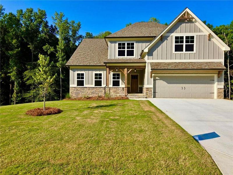 Front exterior of a new home in , Waleska, GA, highlighting curb appeal (Image 2). Front exterior of a new home in , Waleska, GA, highlighting curb appeal (Image 2).