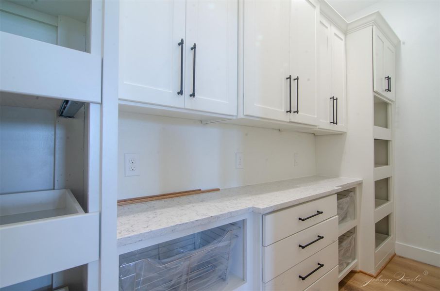 Walk In Pantry with built ins and countertop space allow you to keep your kitchen counters clutter free. Walk In Pantry with built ins and countertop space allow you to keep your kitchen counters clutter free.