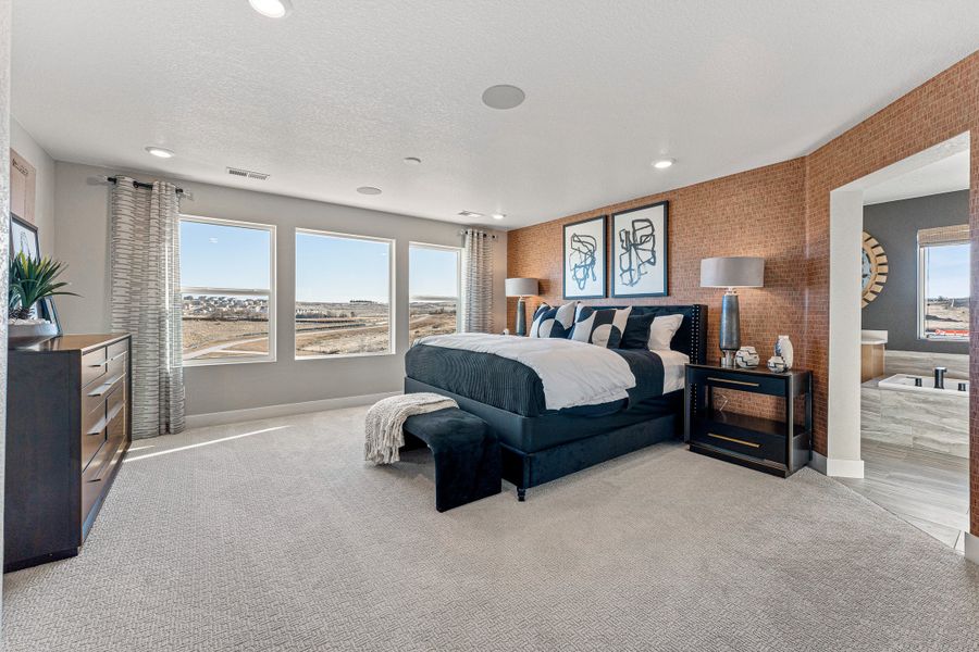 Representative furnished interior of a home built from the Roxborough by Taylor Morrison in Trailstone, Arvada (Image 5).