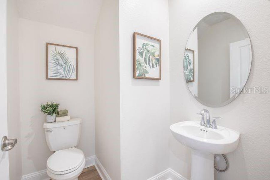 Furnished interior view inside a new home in Lake Deer Estates, Poinciana (Image 11).