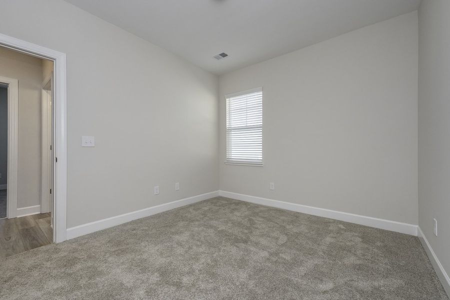 Representative unfurnished interior of a home built from the The Hunter by Cothran Homes in Holly Ridge, Greenville (Image 22).