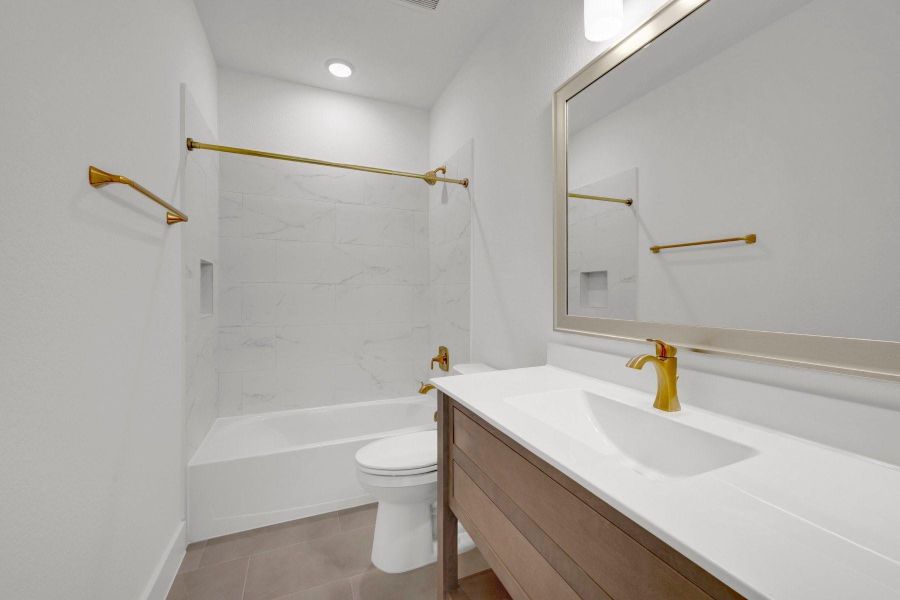 Furnished interior view inside a new home in The Highlands - Grove Collection, Porter (Image 13).