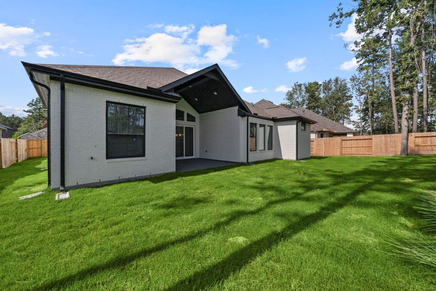 Exterior details and patio area of a home in Evergreen, Conroe (Image 2). Exterior details and patio area of a home in Evergreen, Conroe (Image 2).
