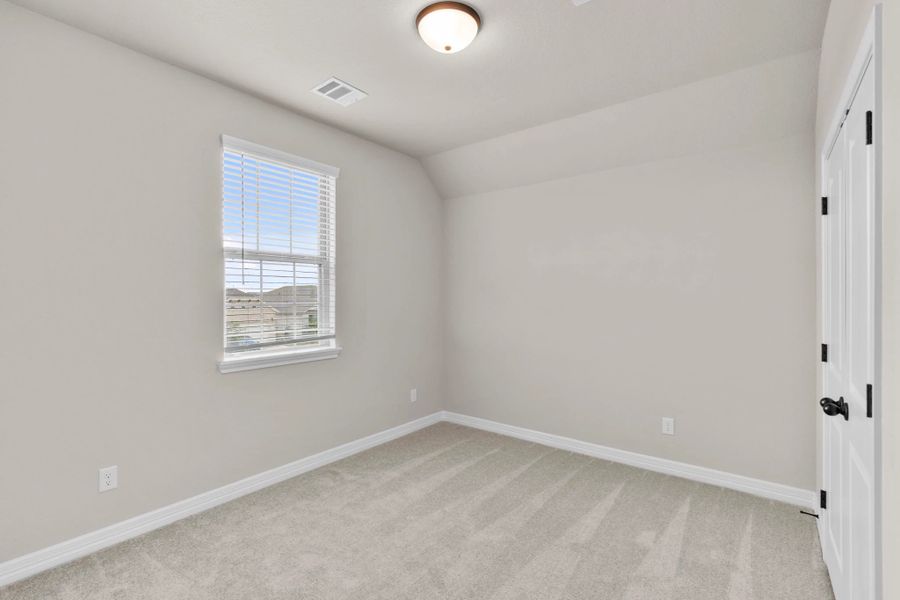 Secondary bedroom. Sample product photo. Actual exterior and interior selections may vary by homesite. Photo may be virtually staged.