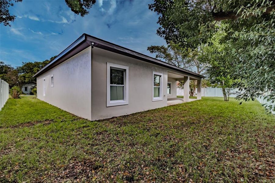 Exterior details and patio area of a home in , New Port Richey (Image 23).