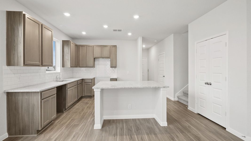 Furnished interior view inside a new home in Hunters Ranch, San Antonio (Image 6).