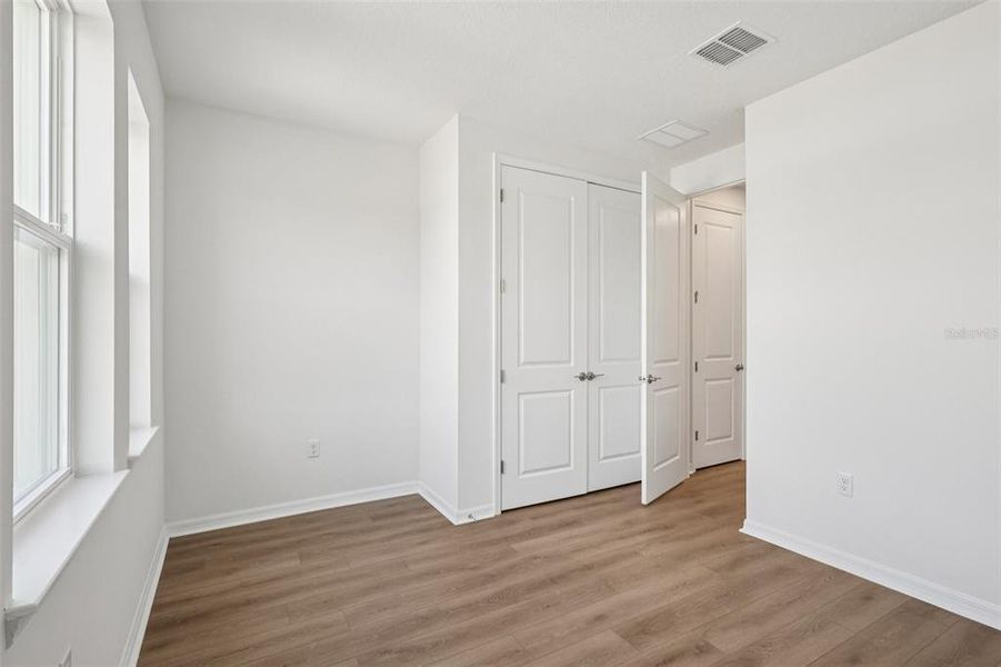 Spacious, unfurnished interior of a new home in Primrose at Longleaf, New Port Richey (Image 21). Spacious, unfurnished interior of a new home in Primrose at Longleaf, New Port Richey (Image 21).