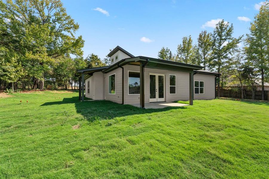 Exterior details and patio area of a home in , Lindale (Image 3). Exterior details and patio area of a home in , Lindale (Image 3).