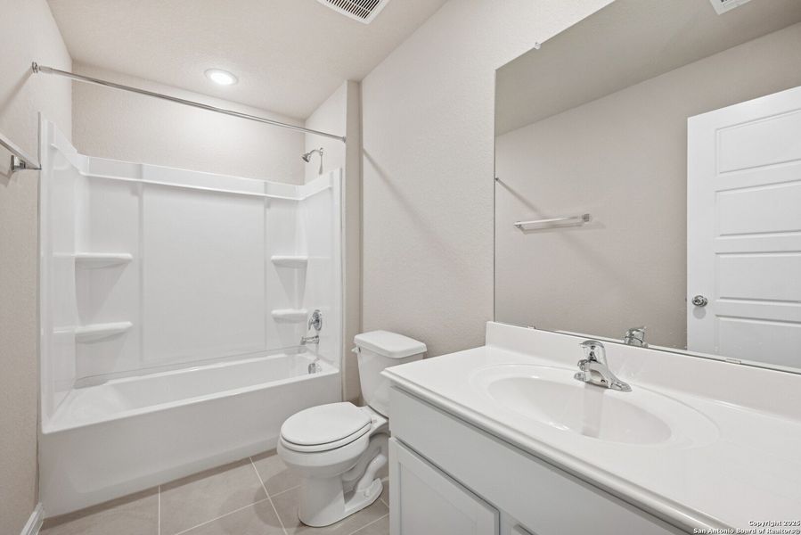 Furnished interior view inside a new home in Greenspoint Heights, Seguin (Image 6).