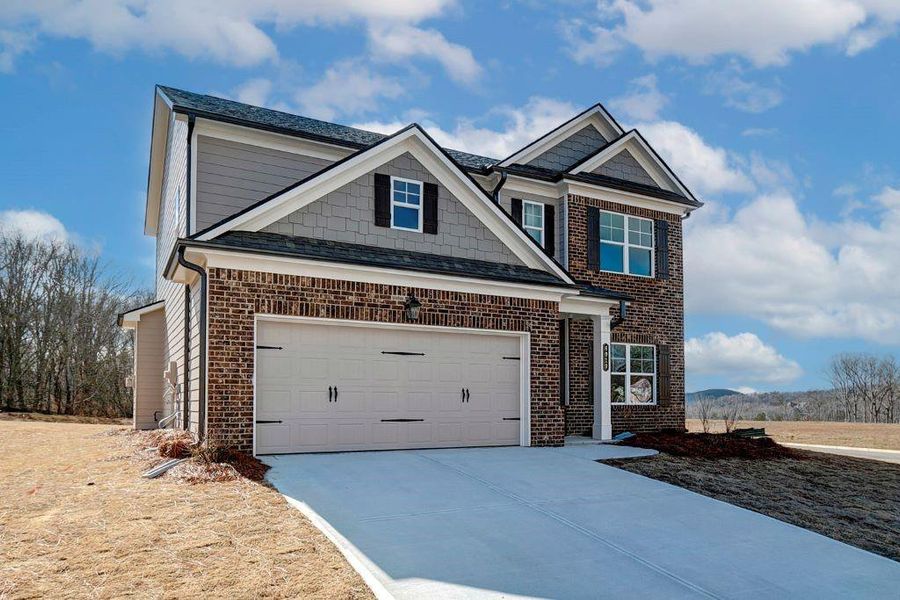 Front exterior of a new home in Summerlin, Winder, GA, highlighting curb appeal (Image 17).