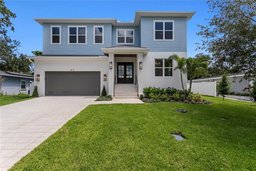 Front exterior of a new home in , Tampa, FL, highlighting curb appeal (Image 32).