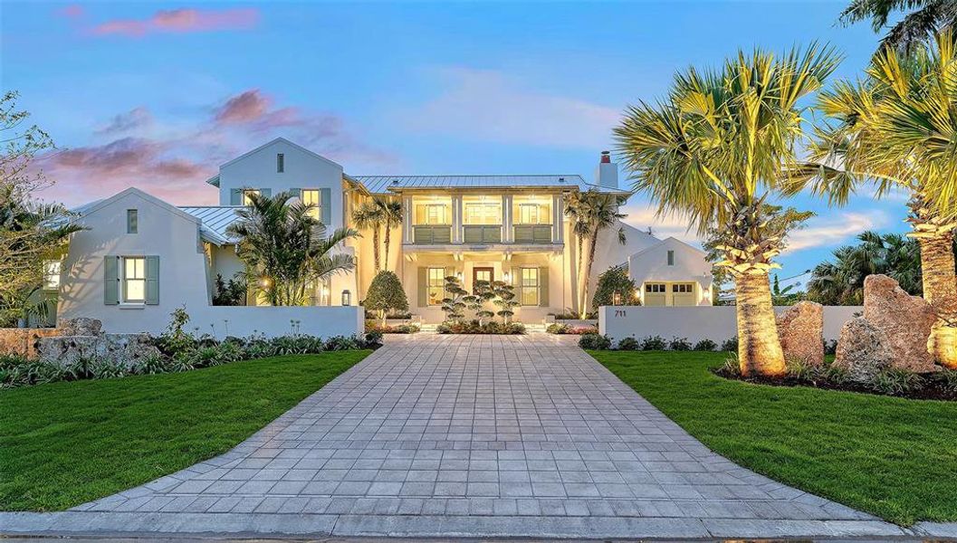 Front exterior of a new home in , Longboat Key, FL, highlighting curb appeal (Image 22). Front exterior of a new home in , Longboat Key, FL, highlighting curb appeal (Image 22).