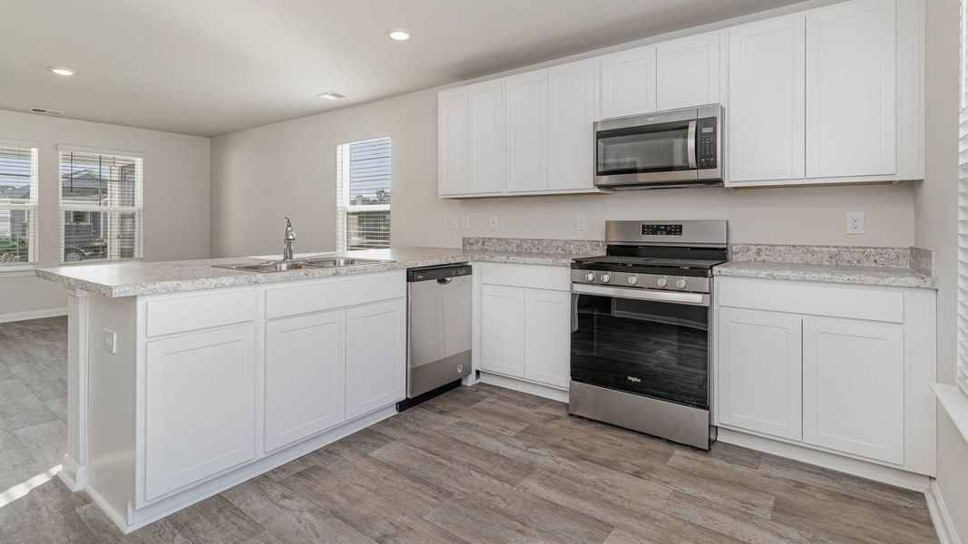 Representative furnished interior of a home built from the CURTIS by D.R. Horton in The Cottages at Blake Farm, Wilmington (Image 20). Representative furnished interior of a home built from the CURTIS by D.R. Horton in The Cottages at Blake Farm, Wilmington (Image 20).