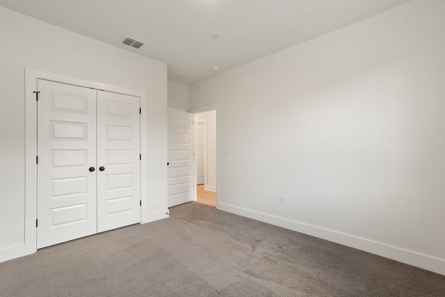 Spacious, unfurnished interior of a new home in Koenig Townhomes, Austin (Image 13).