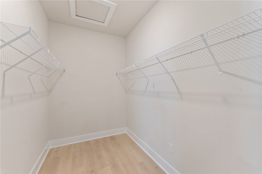 Primary Walk-In Closet Primary Walk-In Closet