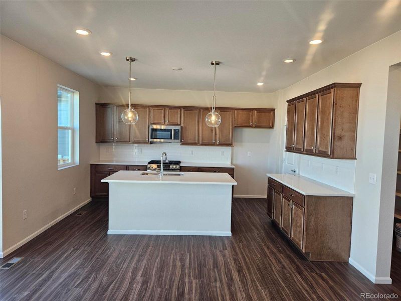 Furnished interior view inside a new home in The Cottages Collection at Ridgeline Vista, Brighton (Image 4). Furnished interior view inside a new home in The Cottages Collection at Ridgeline Vista, Brighton (Image 4).