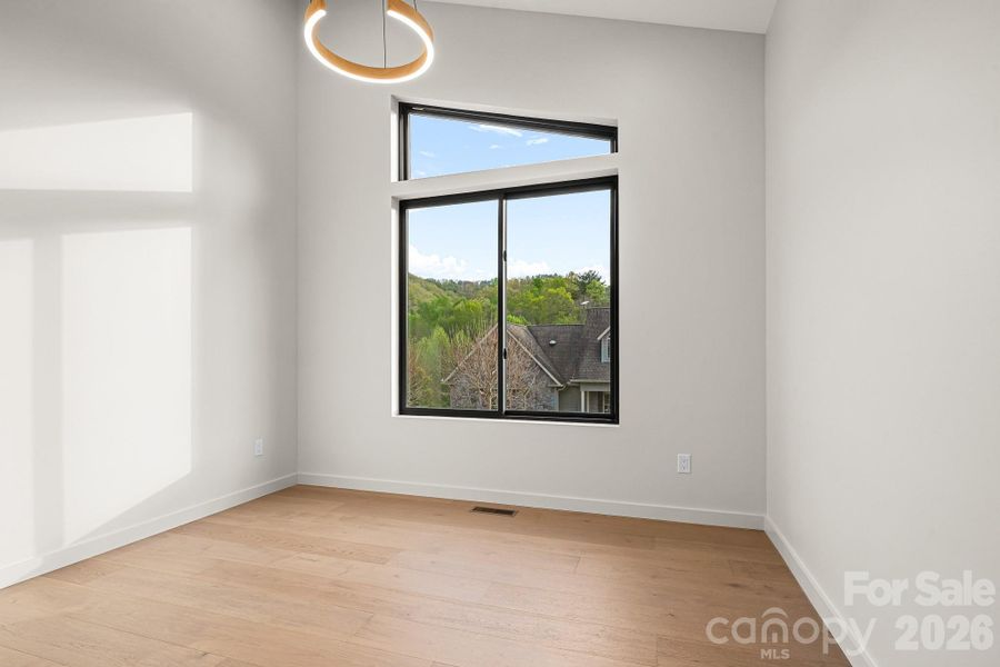 Spacious, unfurnished interior of a new home in , Candler (Image 37).
