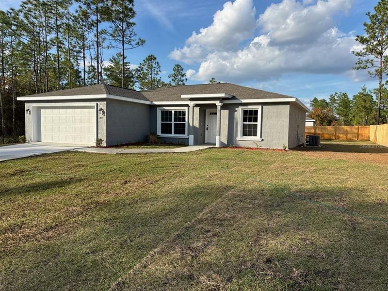 Exterior details and patio area of a home in , Citrus Springs (Image 22).