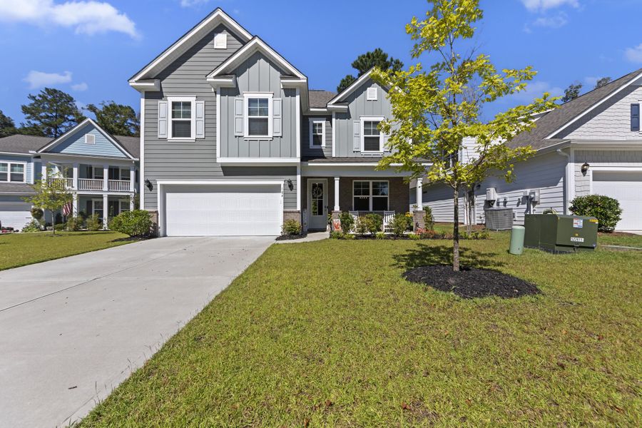 Front exterior of a new home in The Ponds, Summerville, SC, highlighting curb appeal (Image 25).