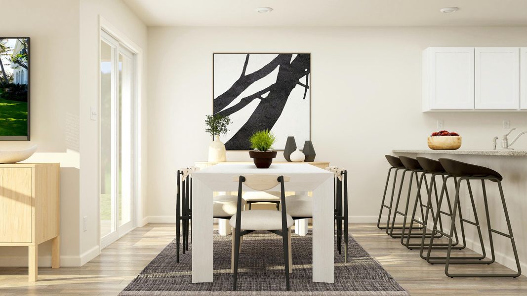 A dining room with a table and chairs. A dining room with a table and chairs.