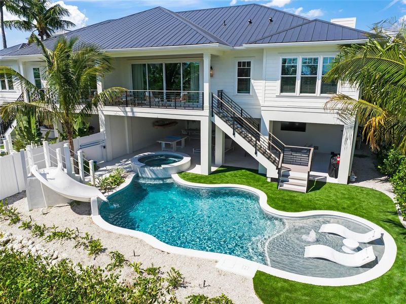 Front exterior of a new home in , Sarasota, FL, highlighting curb appeal (Image 35).