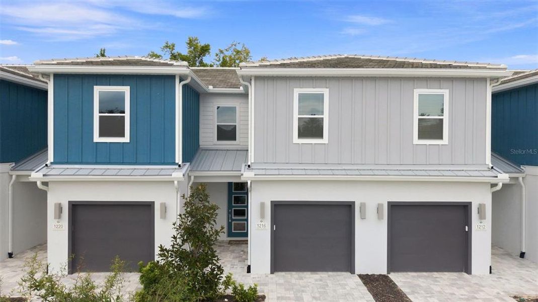 Front exterior of a new home in , Kissimmee, FL, highlighting curb appeal (Image 1). Front exterior of a new home in , Kissimmee, FL, highlighting curb appeal (Image 1).