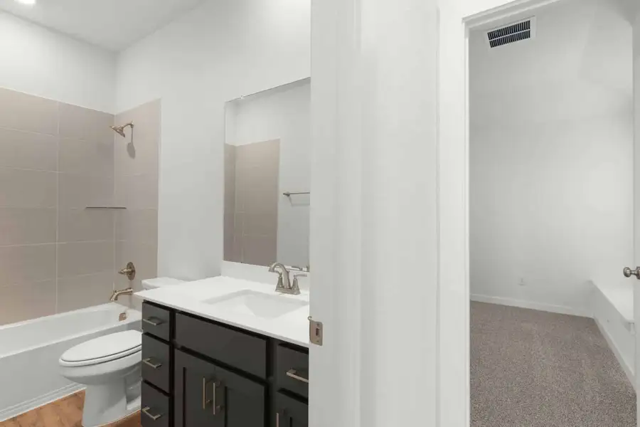 Furnished interior view inside a new home in The Grove at Blackhawk, Pflugerville (Image 8). Furnished interior view inside a new home in The Grove at Blackhawk, Pflugerville (Image 8).