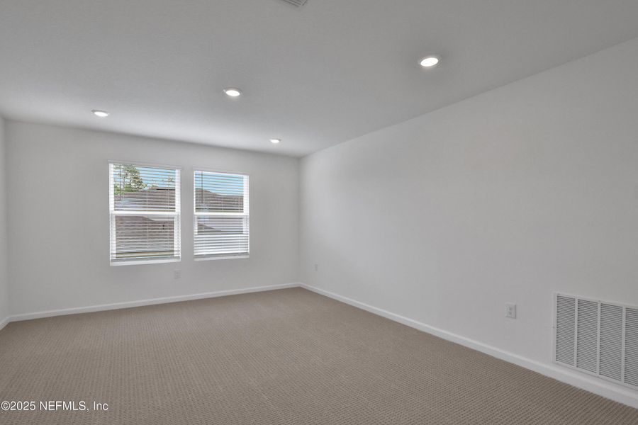 Spacious, unfurnished interior of a new home in Cordova Palms, St. Augustine (Image 25).