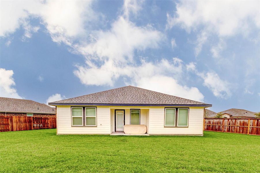 Exterior details and patio area of a home in Canterra Creek 45' and 50' Homesites, Iowa Colony (Image 22).