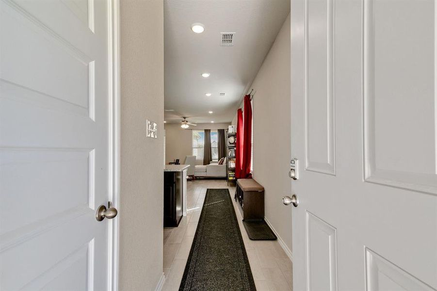 Hall featuring light wood-type flooring