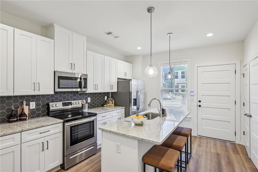 Furnished interior view inside a new home in Avenue at Oakland City, Atlanta (Image 12).