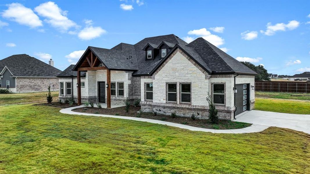 Front exterior of a new home in , Weatherford, TX, highlighting curb appeal (Image 23).