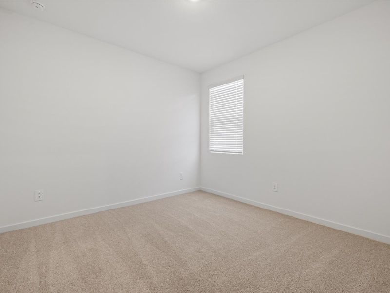 Spacious, unfurnished interior of a new home in Rancho Mirage Estate Series, Maricopa (Image 15).
