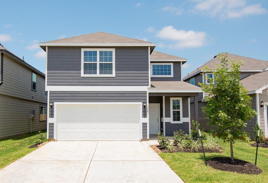 Front exterior of a new home in Cliffstone Hills, Conroe, TX, highlighting curb appeal (Image 1). Front exterior of a new home in Cliffstone Hills, Conroe, TX, highlighting curb appeal (Image 1).