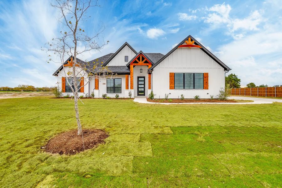 Representative exterior photo of a completed home built from the The Magnolia by Elmwood Custom Homes in Matthews Farm, Venus, TX (Image 2). Representative exterior photo of a completed home built from the The Magnolia by Elmwood Custom Homes in Matthews Farm, Venus, TX (Image 2).