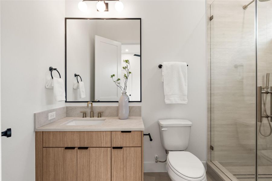 Bath 2 features a full sized shower. Bath 2 features a full sized shower.
