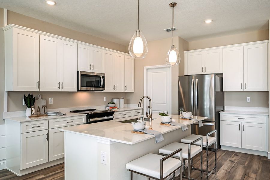 Representative furnished interior of a home built from the Mariposa by Casa Fresca Homes in Mirada, San Antonio (Image 10).