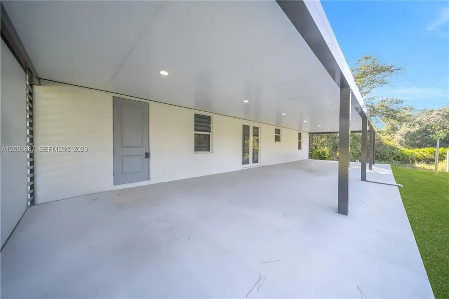 Exterior details and patio area of a home in , Lehigh Acres (Image 21).