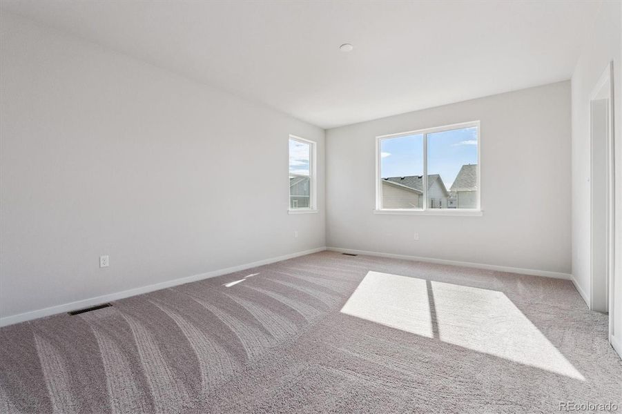 Spacious, unfurnished interior of a new home in Floret Collection at Parkdale Commons, Lafayette (Image 23).