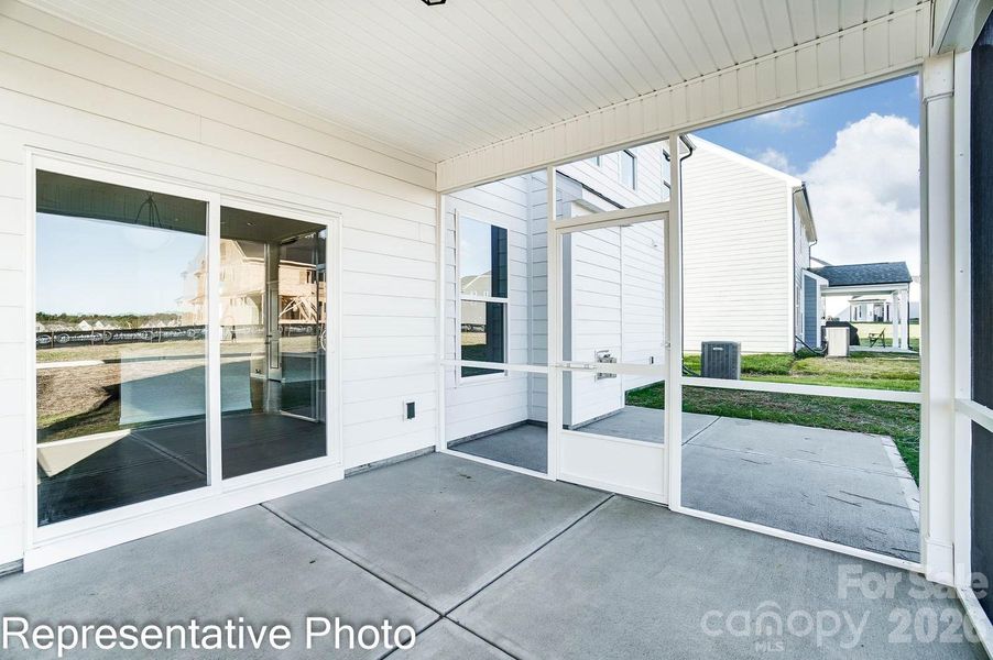 Exterior details and patio area of a home in Enclave at Riverdale, Huntersville (Image 16).