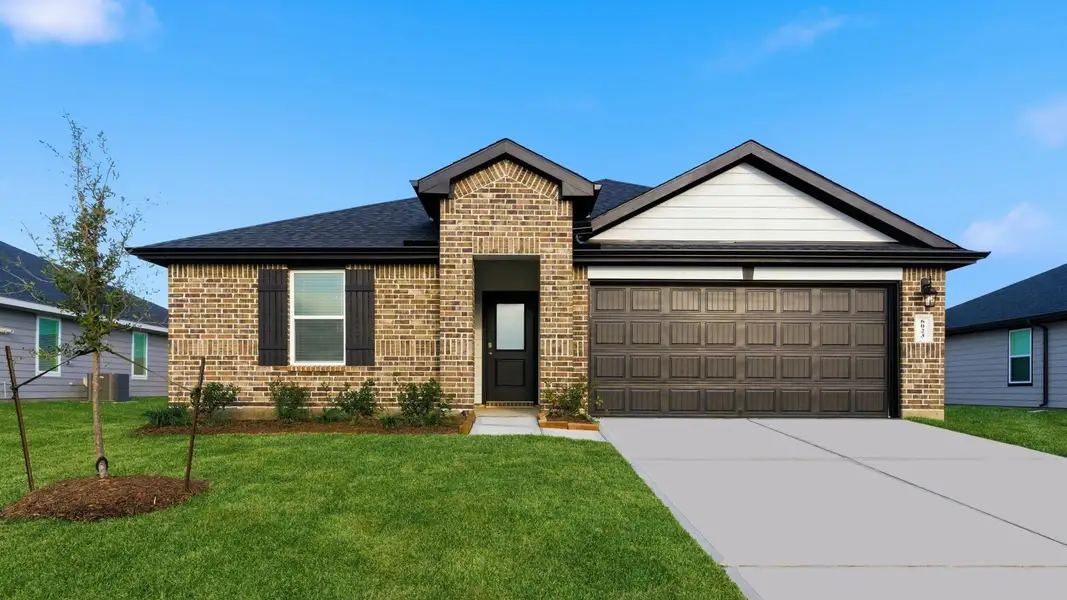 Front exterior of a new home in Evergreen, Rosenberg, TX, highlighting curb appeal (Image 2).