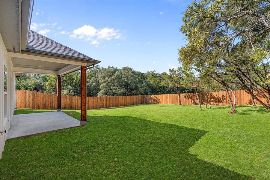 View of yard with a patio