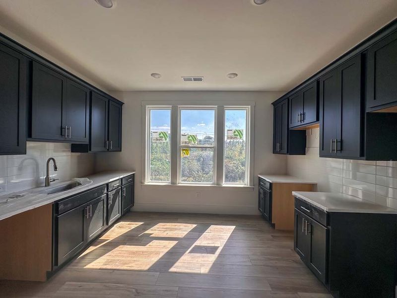 Kitchen featuring Industrial Collection Finishes Construction Progress