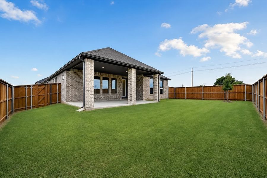 Exterior details and patio area of a home in The Ranch at Uptown Celina, Celina (Image 19).