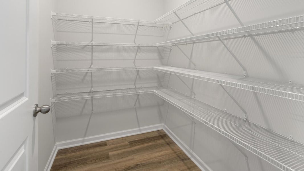 Representative unfurnished interior of a home built from the HARBOR OAK by D.R. Horton in Indigo Preserve, Leland (Image 23).