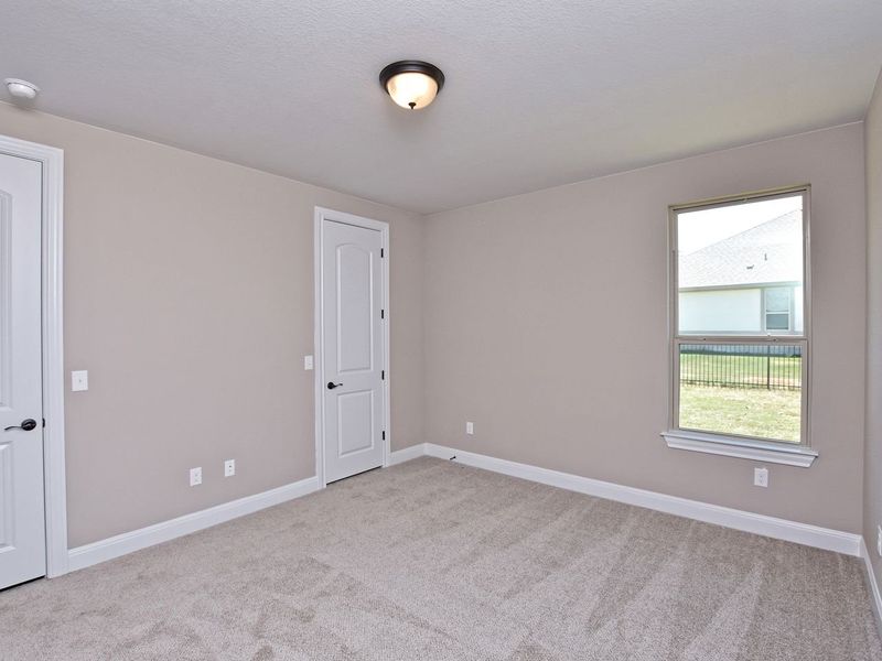 Representative unfurnished interior of a home built from the San Simeon I by Giddens Homes in Clearwater Ranch, Liberty Hill (Image 403).