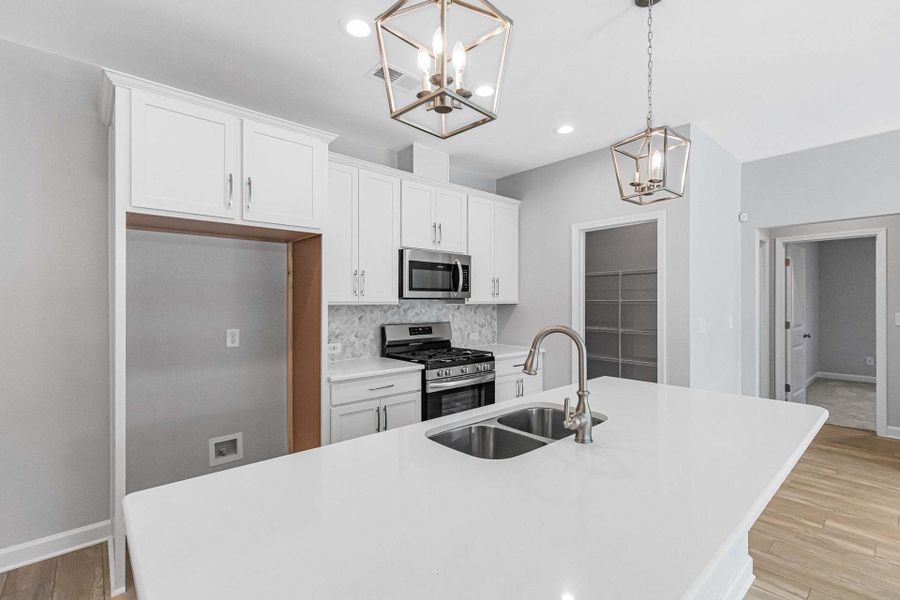 Representative furnished interior of a home built from the Weymouth by Caviness & Cates Communities in Bartlett Manor, Youngsville (Image 121).