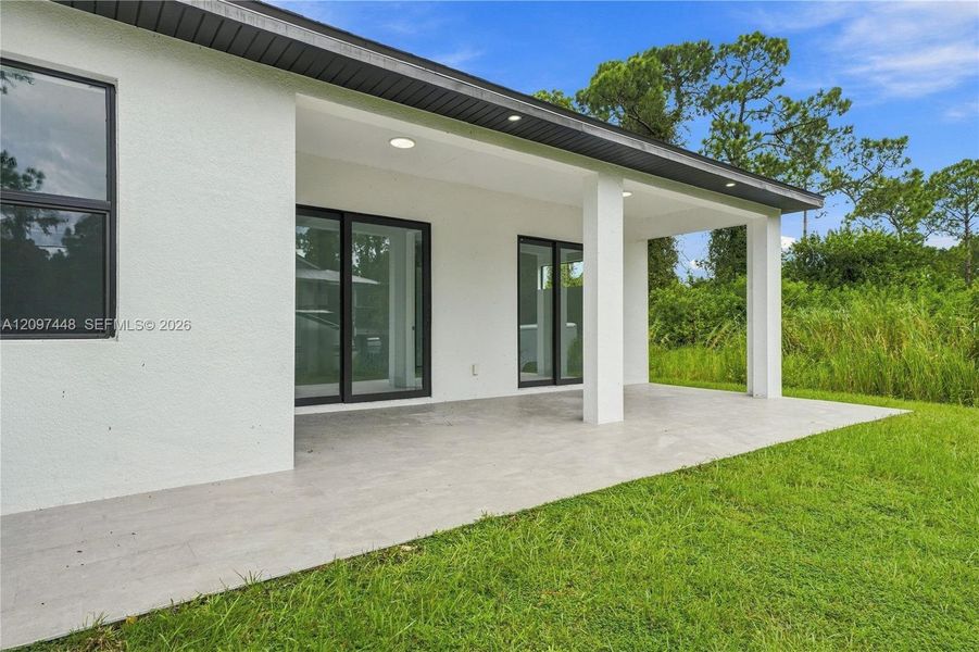 Exterior details and patio area of a home in , Lehigh Acres (Image 3).