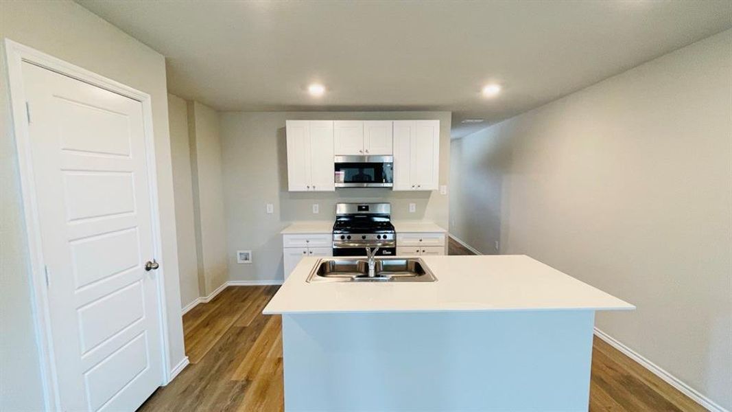 Kitchen - All Home and community information, including pricing, included features, terms, availability and amenities, are subject to change at any time without notice or obligation. All Drawings, pictures, photographs, video, square footages, floor plans, elevations, features, colors and sizes are approximate for illustration purposes only and will vary from the homes as built.